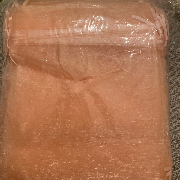 Light peach 5x7 organza bags. Says champagne color - it’s a light peach. - Picture 3 of 5